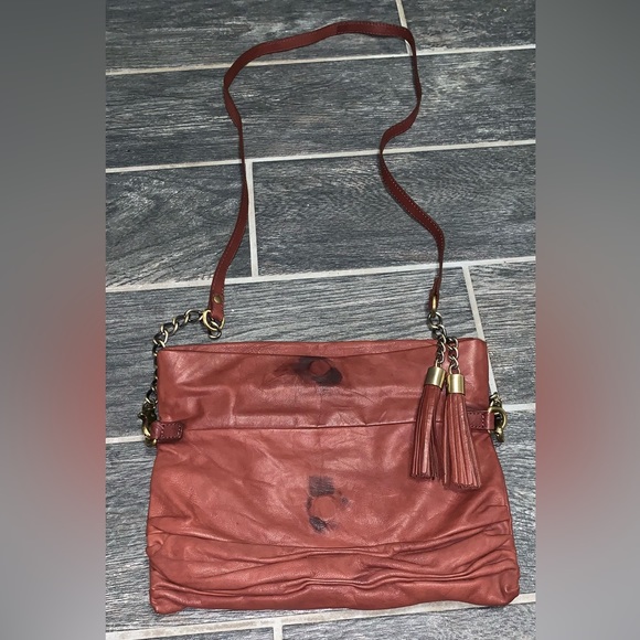Avant Premiere Rust Colored Magnetic Roll Down Crossbody Bag W/Zip Tassel detail - Picture 2 of 5